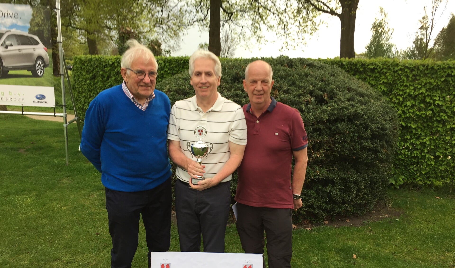 De beste drie van de HenK Golf wedstrijd: (v.l.n.r.) Thomas Verheul, Michael Turner en Hans Huntelaar.