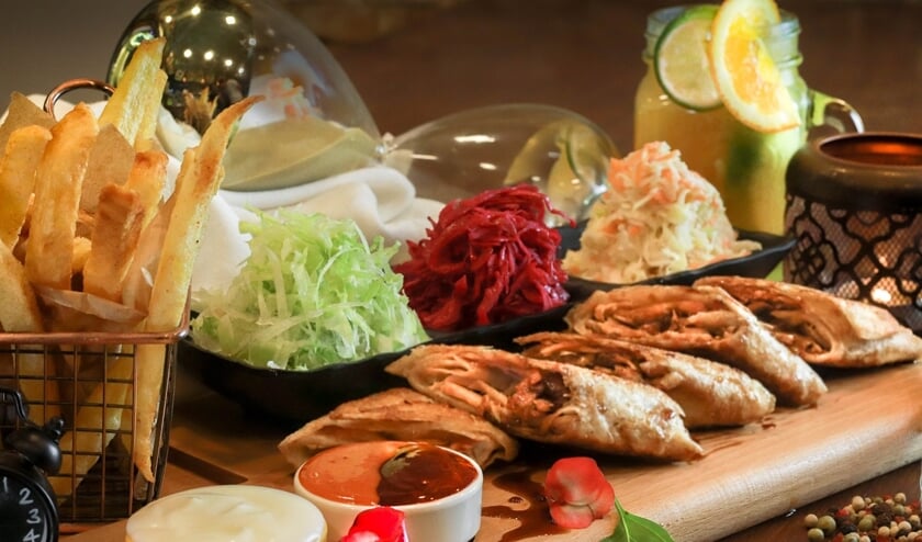 Elkaar informeel ontmoeten door samen te eten. Foto: Pixabay