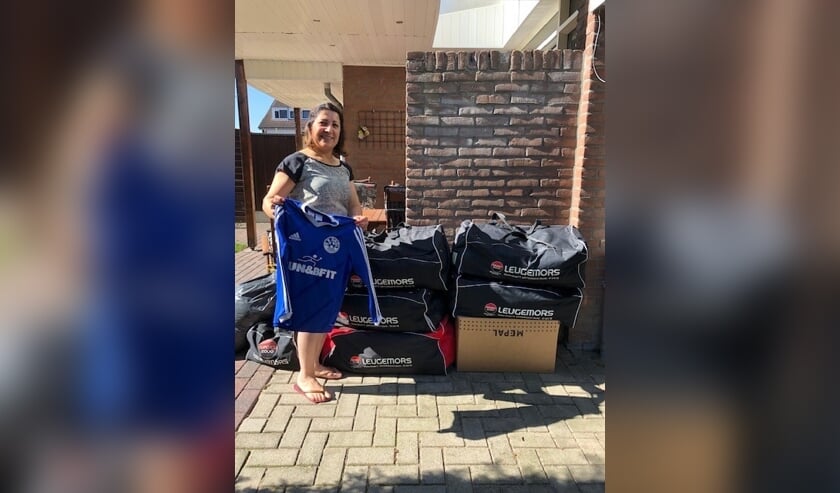 Dilsoz Wali is blij met de gedoneerde kleding. Foto: PR Grol