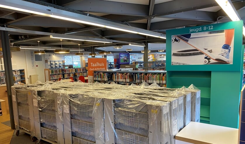 De karren waarmee de boeken worden verhuisd staan al klaar aan de Dijkstraat.De karren waarmee de boeken worden verhuisd staan al klaar aan de Dijkstraat. Foto: PR