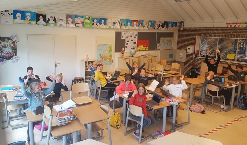 De leerlingen zijn blij dat ze weer naar de Tormijnschool mogen. Foto: PR