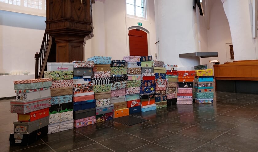 <p>Maar liefst 89 dozen zijn gemaakt tijdens de schoenendoosactie met Sint Maarten. Foto: Rineke van den Berg</p>