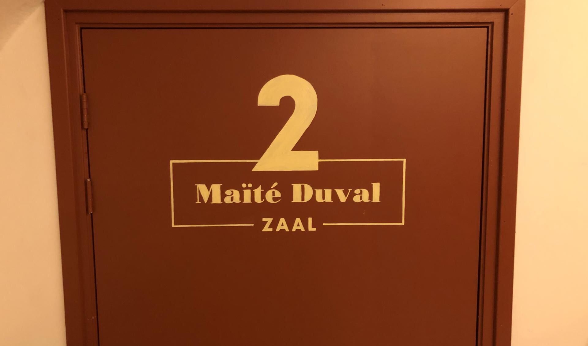 De deur van de onlangs gerealiseerde Maïté Duval-zaal. Foto: PR
