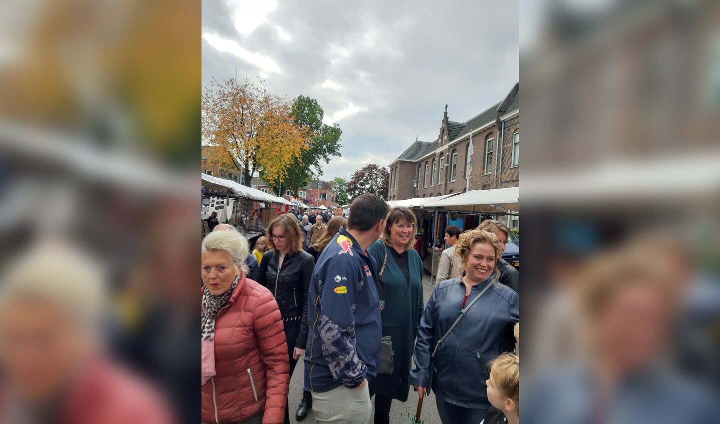 Vrolijke gezichten op de jaarmarkt. Foto: PR