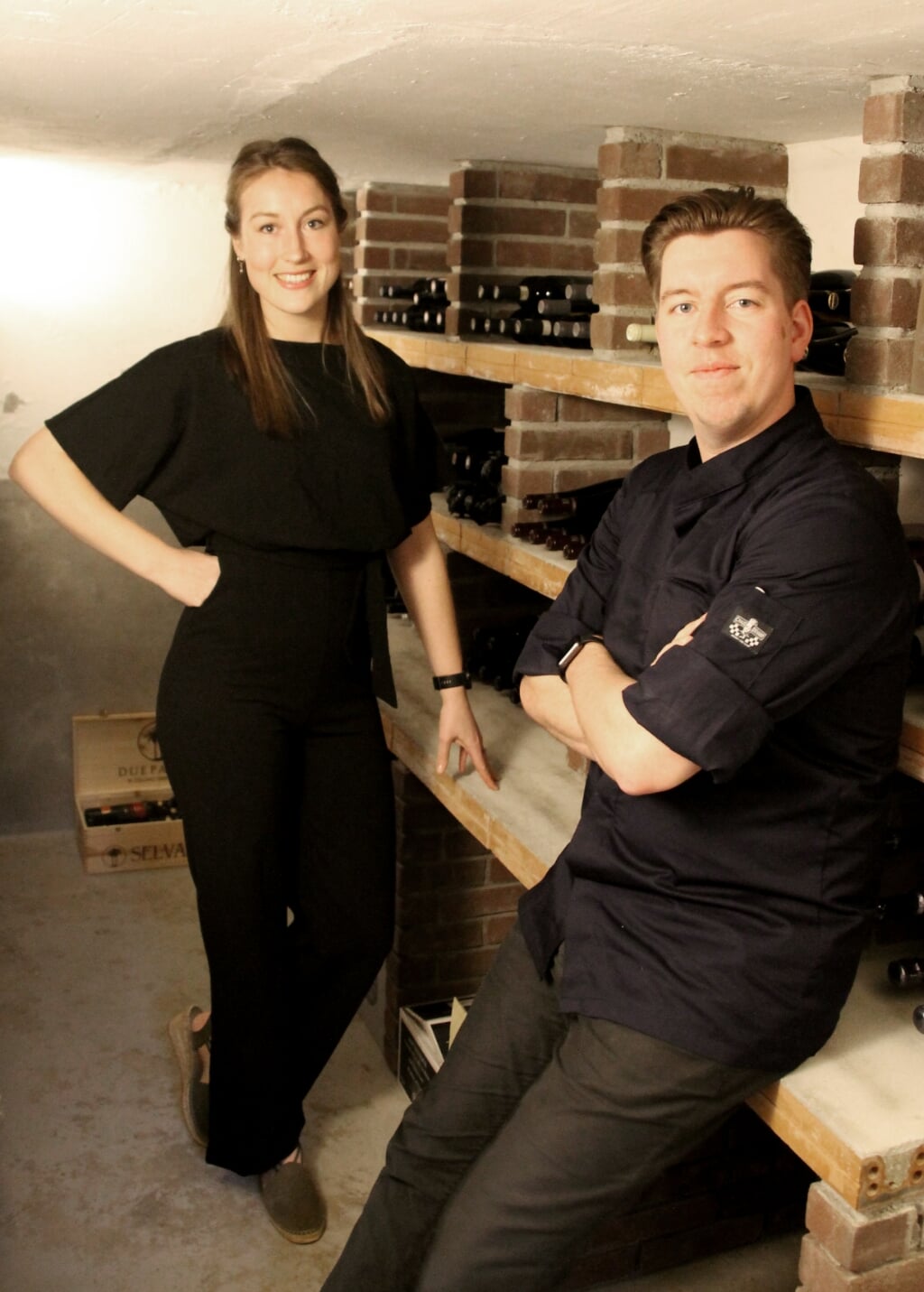 Manon van Lent en Jan Peree in de wijnkelder van hun restaurant Kruidt. Foto: Annekée Cuppers