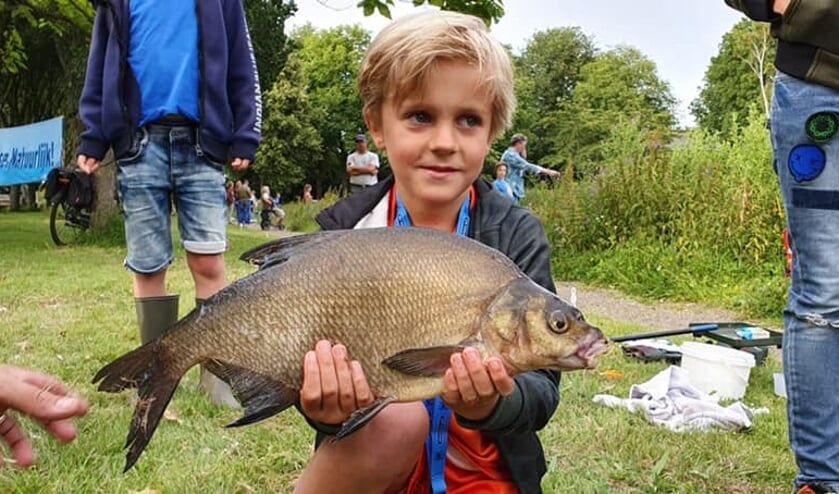 Roel vader met zijn vangst.