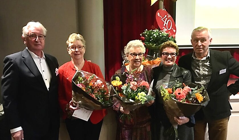 Tijdens de receptie werden drie vrijwilligsters gehuldigd.