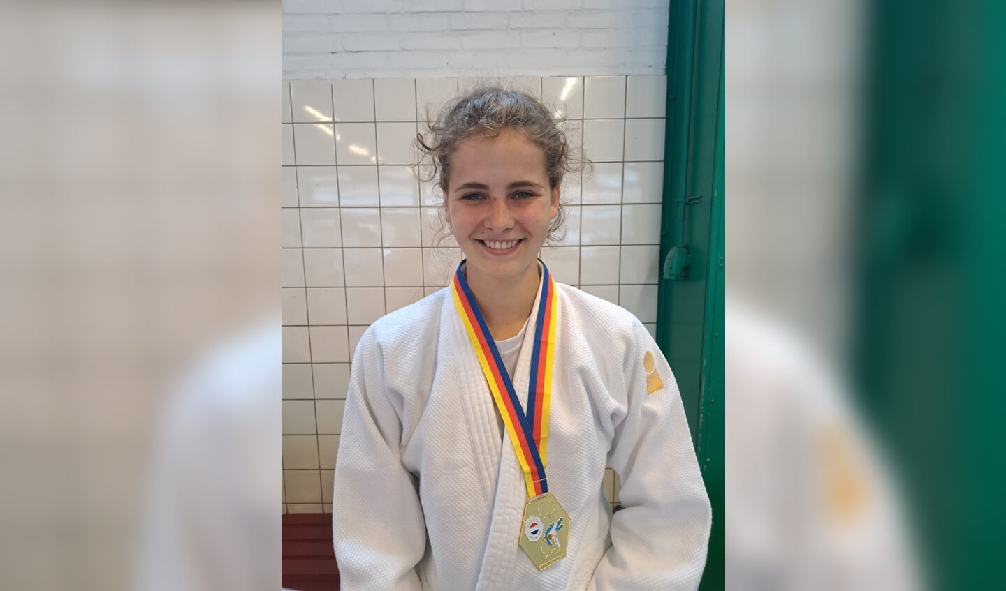 Sija met haar gouden medaille.