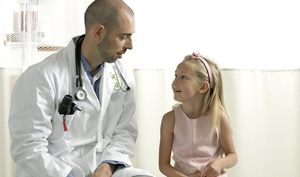 Doctor Consulting Girl --- Image by © jf/cultura/Corbis