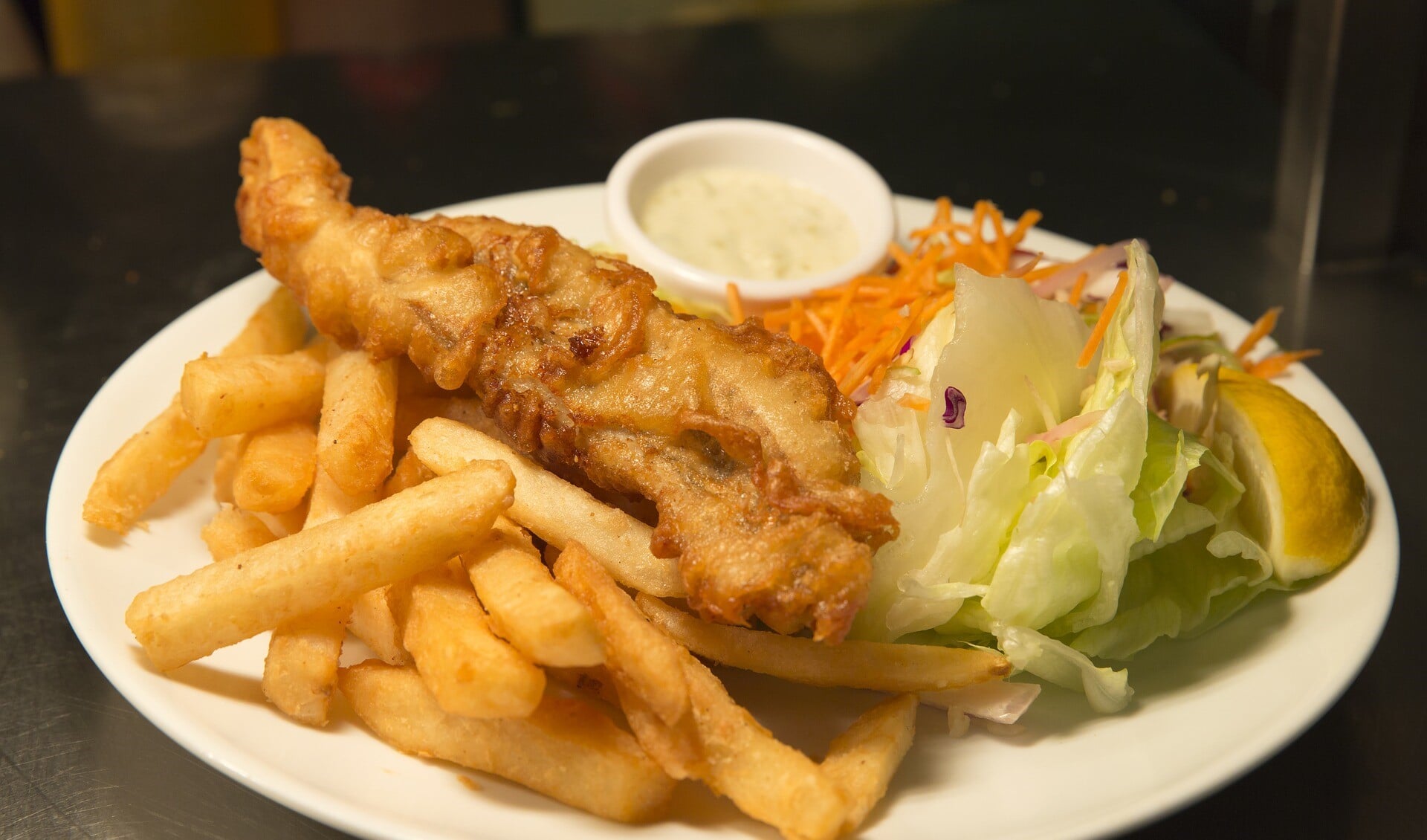 Een simpel gebakken visje met friet wil Kroon in een vispaviljoen in de Oude Haven serveren.