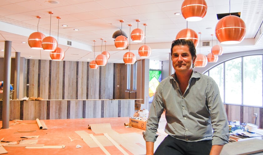 Paul Baartman tijdens de verbouwing van het Vechtstede College in 2013.