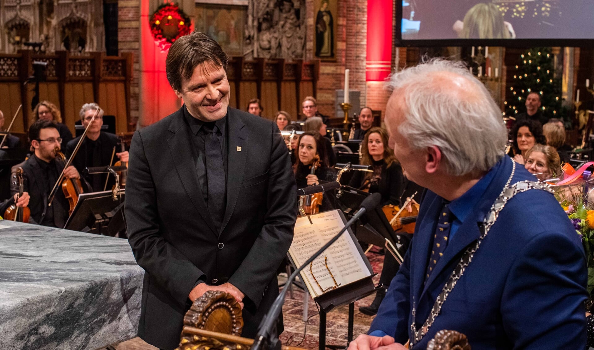 Vorig jaar tijdens de nieuwjaarsreceptie in de Vituskerk ontving het Radio Filharmonisch Orkest de gemeentespeld.  