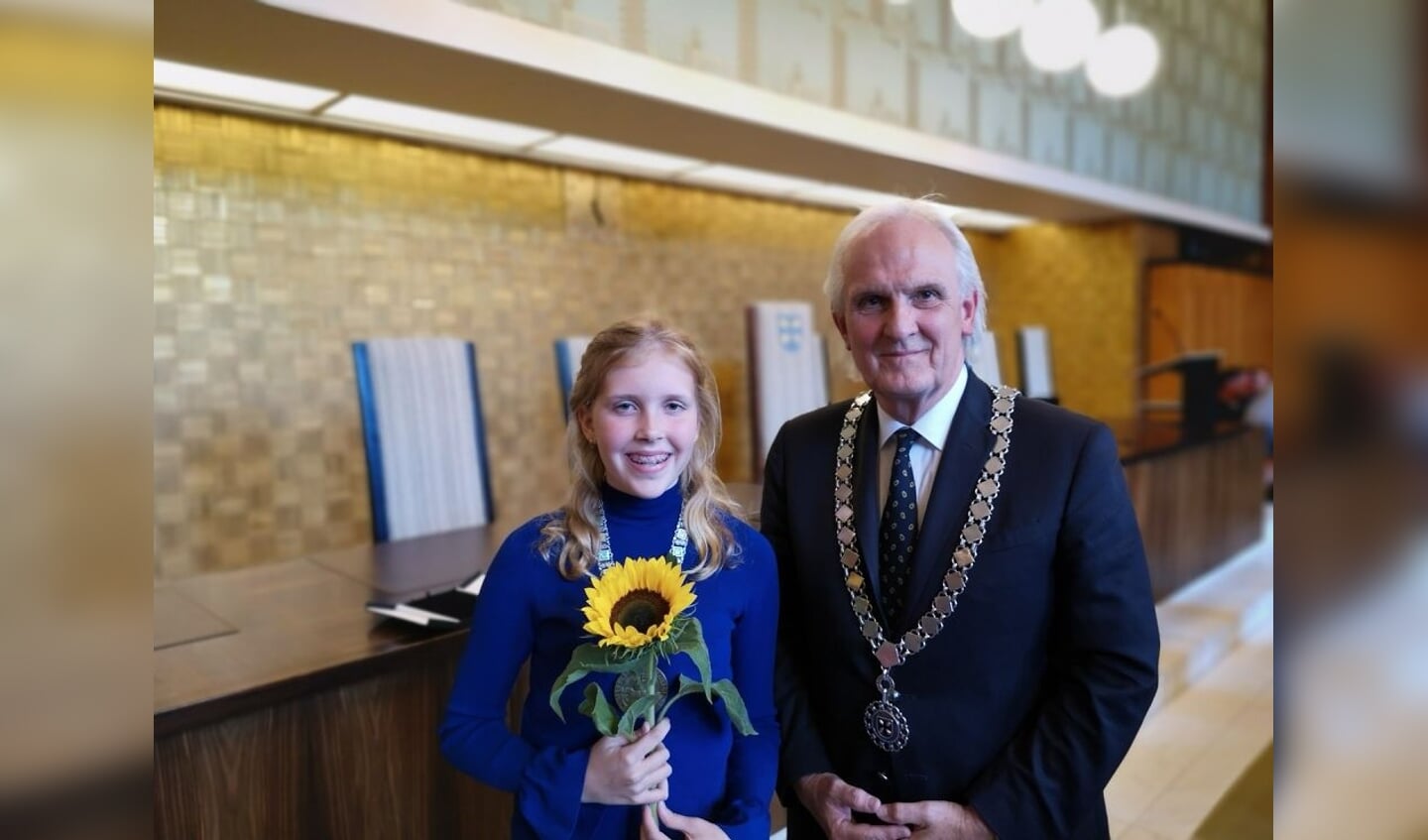 De kinderburgemeester en de burgemeester.