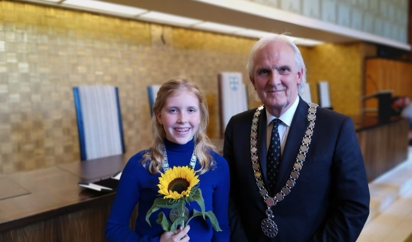 De kinderburgemeester en de burgemeester.