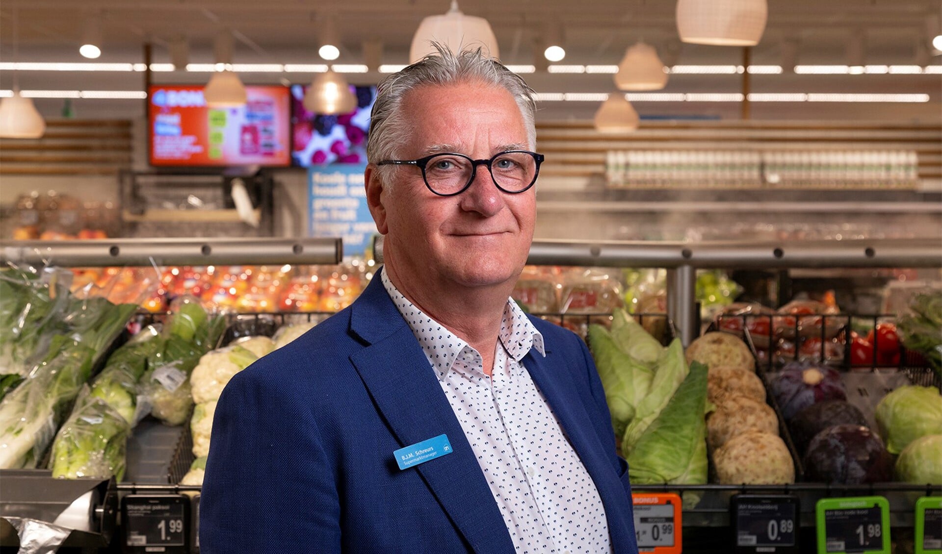 Supermarktmanager Ben Schreurs verheugt zich op de vernieuwde AH Langestraat.
