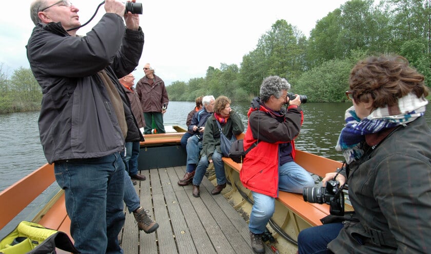 Vang het landschap met een digitaal oog vanaf een fluisterboot.