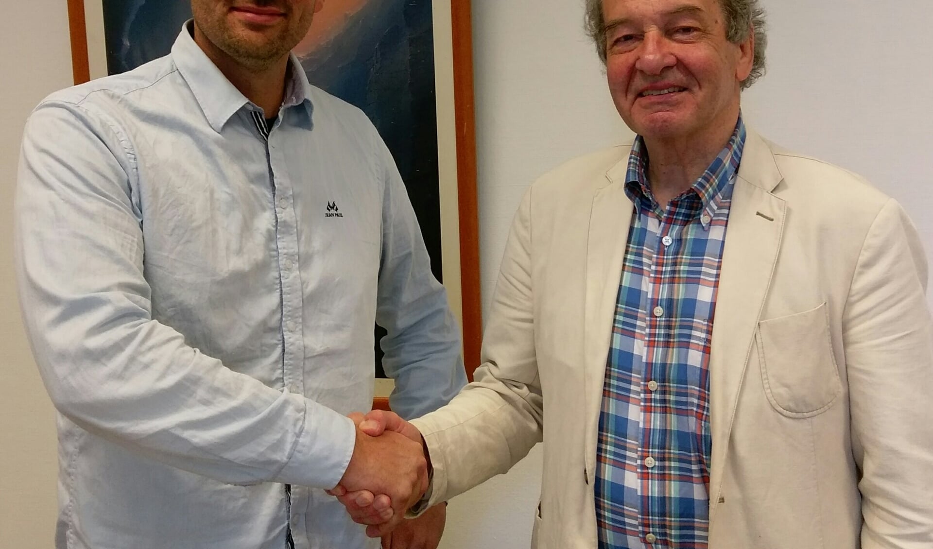 Geert Veldhuizen en wethouder Ebbe Rost van Tonningen.