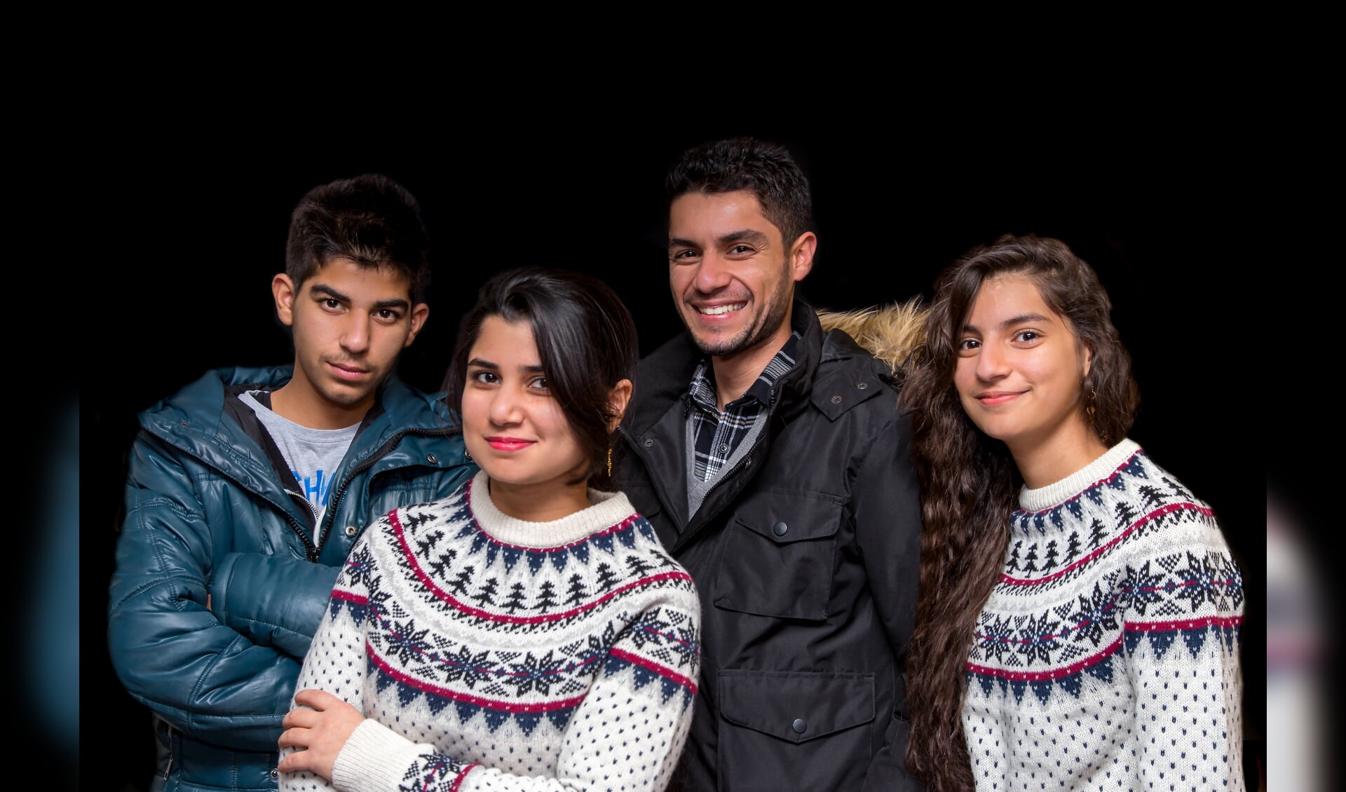 Ahmed (derde van links) hoopt dat hij bij zijn jongere broer en zussen kan blijven.