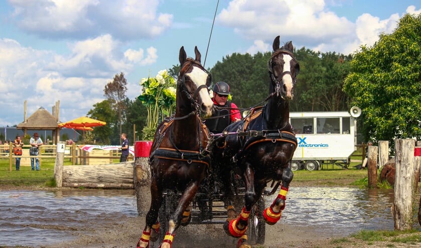 • Ad van Zandwijk op weg naar brons.