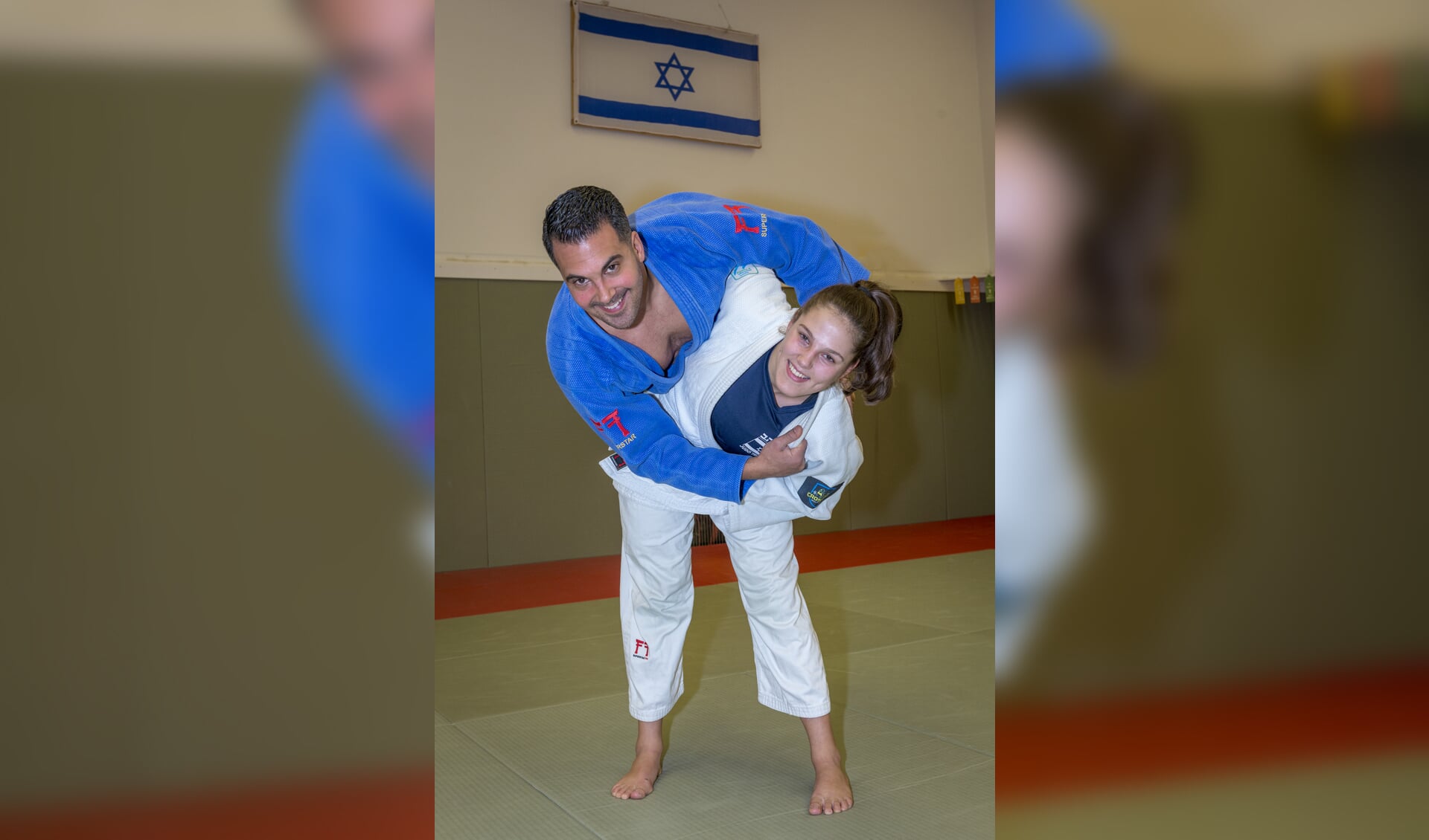 • Judoka Dianne Stolk met haar trainer Daniël Ratzon.