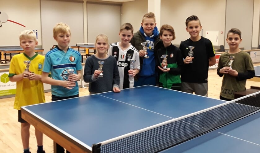 • De winnaars van het tafeltennistoernooi.