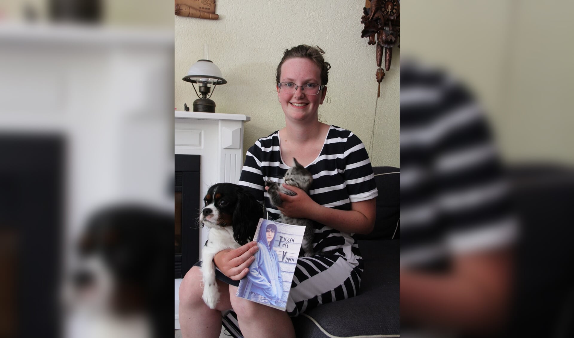 • Gerjanneke met haar hond, katje en haar eerste boek.