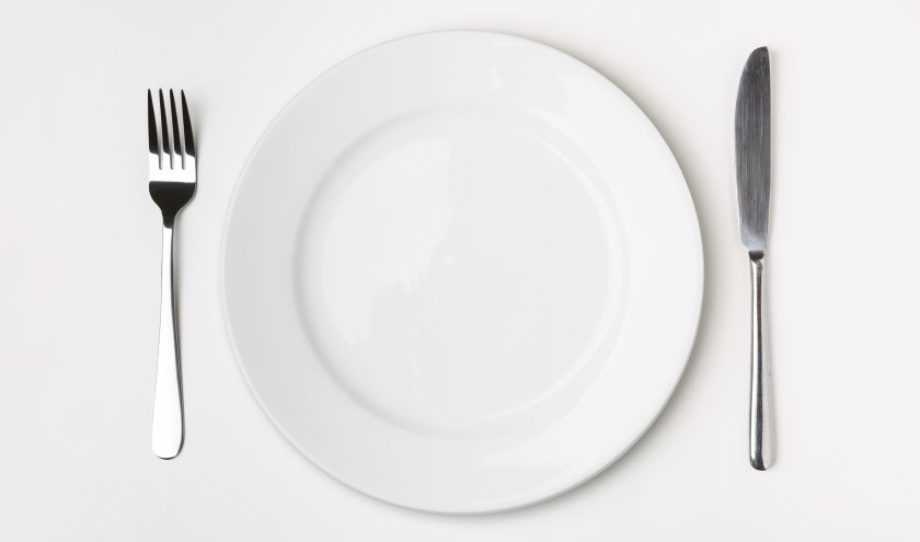 Knife, Fork and plate on table isolated.