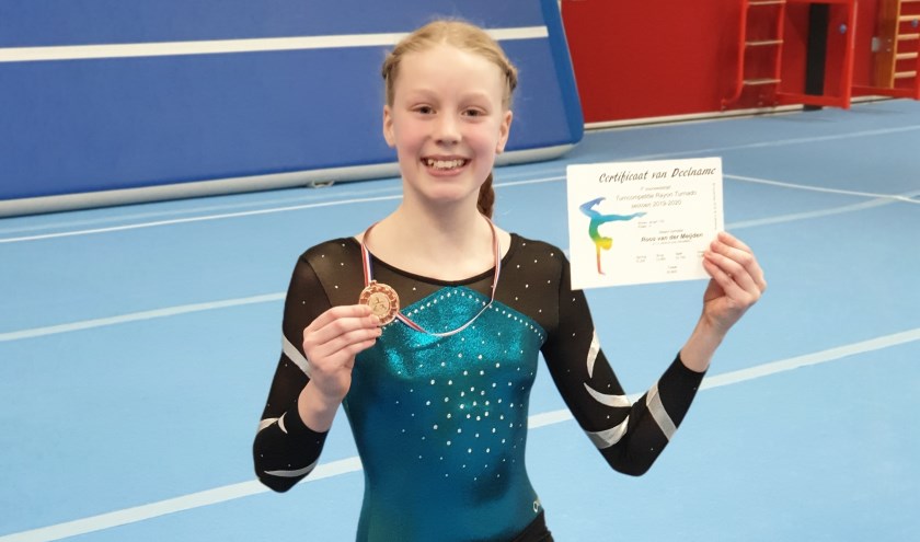 • Roos met haar bronzen medaille.