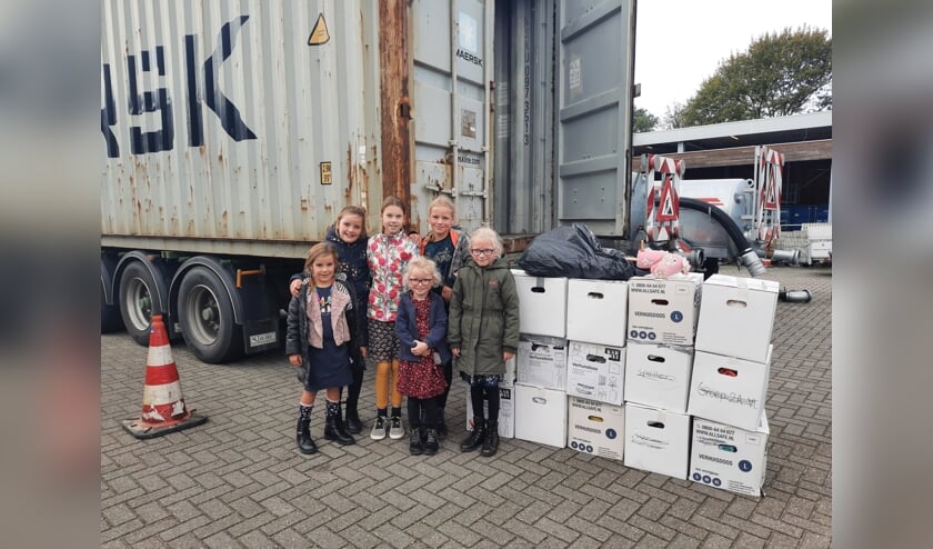 <p>• De initiatiefnemers bij hun 'oogst'.</p>