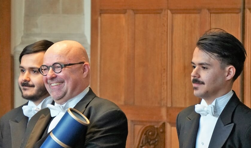 • De promotie in beeld, met v.l.n.r. Marc van 't Veer, Coen van 't Veer, Peter van ’t Veer.