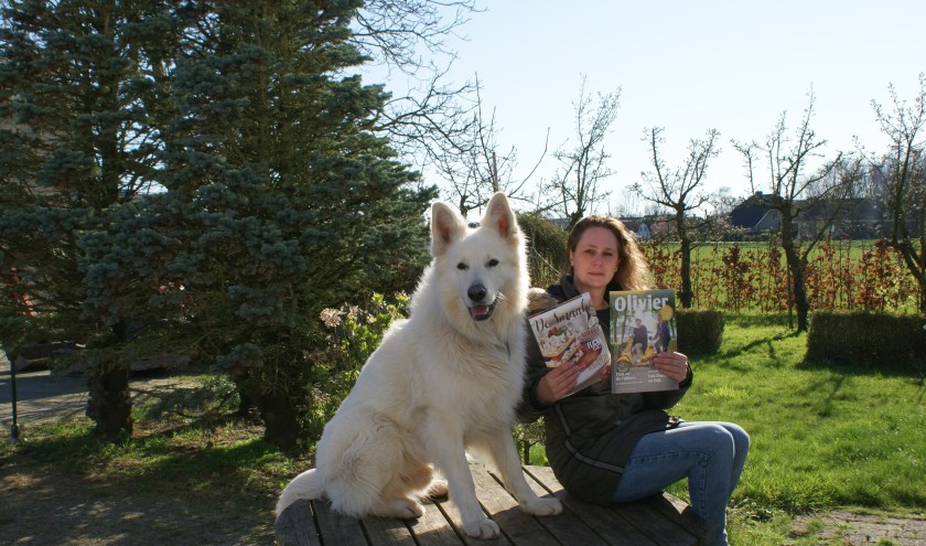 • Melanie van Hemert met haar hond Pim.