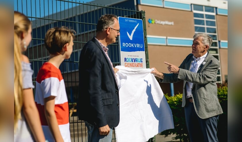 • De onthulling van het schoolbord.