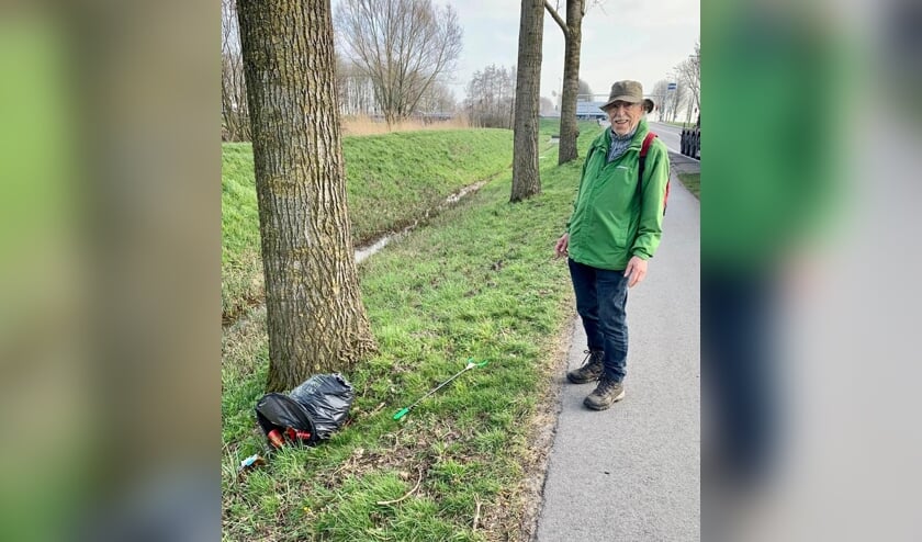 'De man met de prikker en de hoed, Joop van der Grijn uit Goudriaan.'