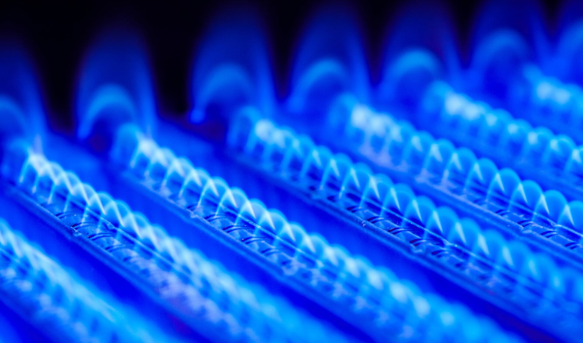 Propane flame inside of gas boiler furnace