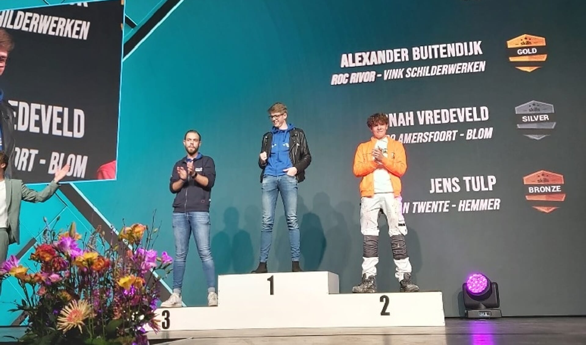 • Alexander Buitendijk op het podium.