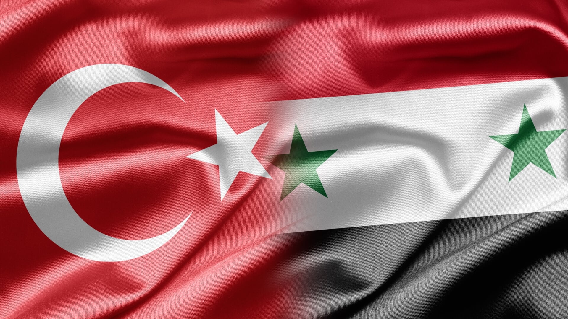 • Vlaggen van Turkije en Syrië.