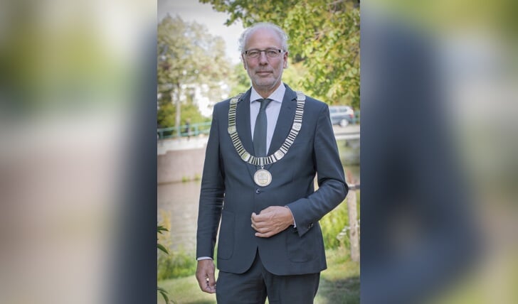 • Burgemeester Victor Molkenboer van Woerden.