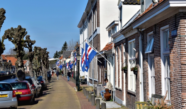<p>Vorig jaar maart hing de Hasselter vlag aan veel huizen in de Hanzestad.</p>