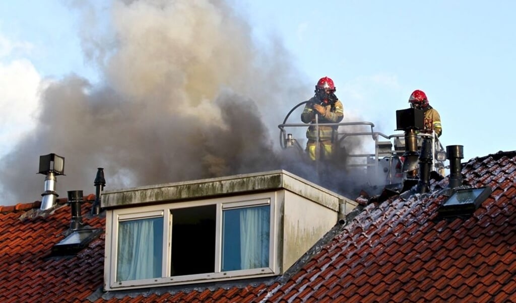  De brandweer in actie aan de Klaversingel.