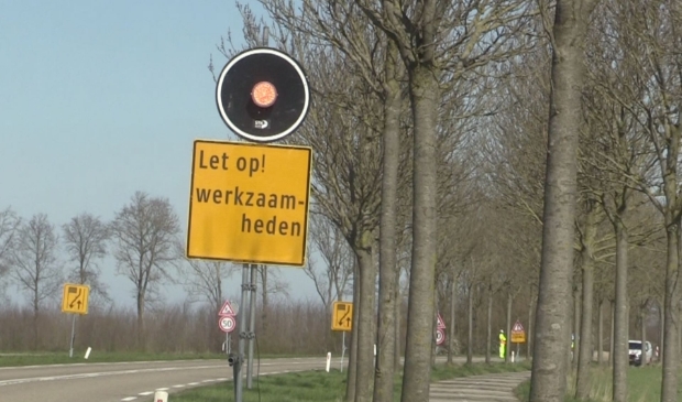 Gele knipperlichten.