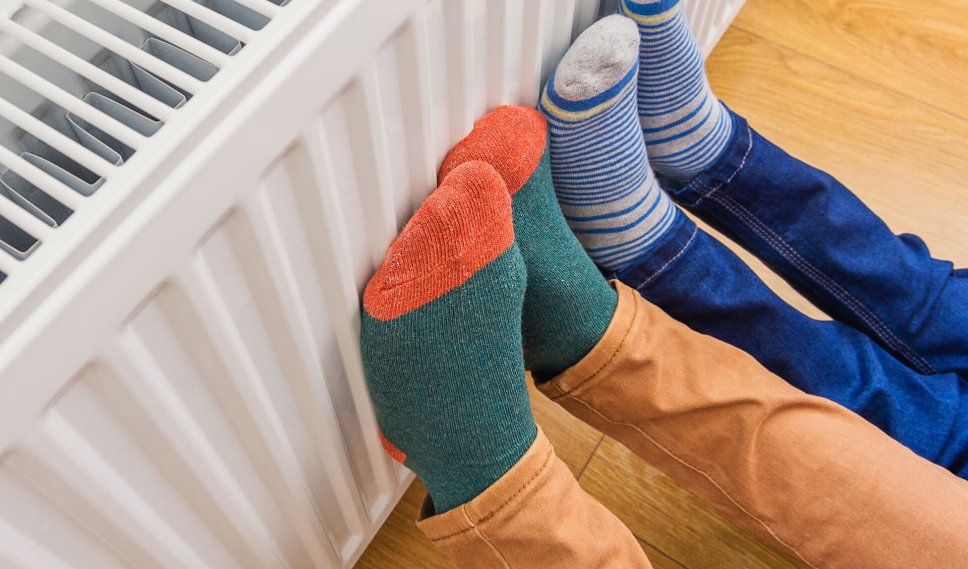 Warme voeten tegen de radiator.