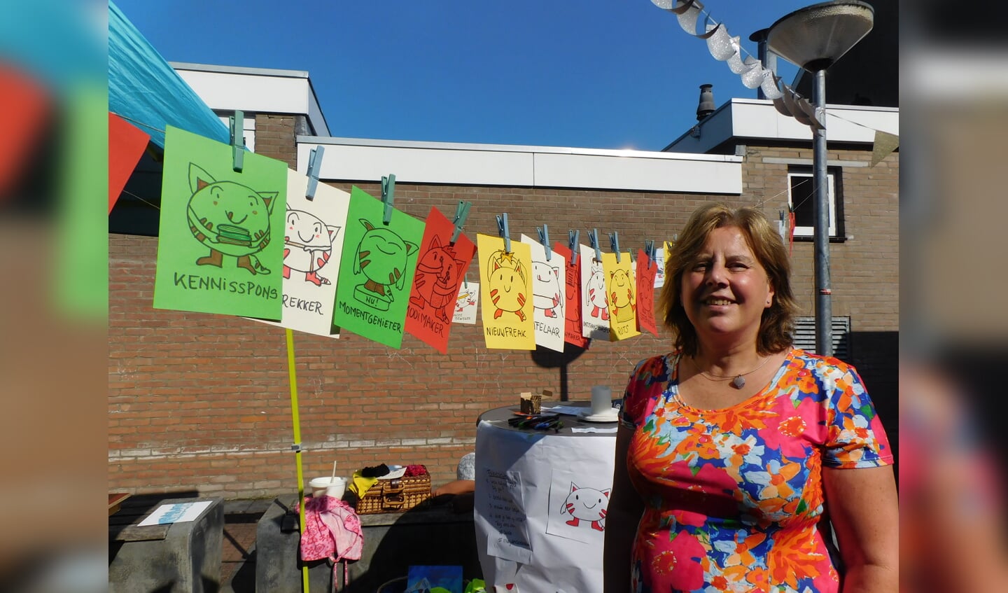 Marjoke Eikelenboom bij haar stand achter de Buze -