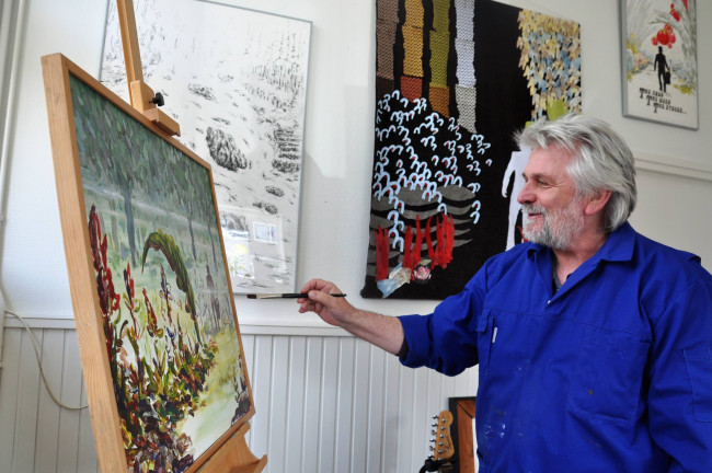 Mysterieuze reiziger met gitaar vindt bestemming op expositie in De Sigaar