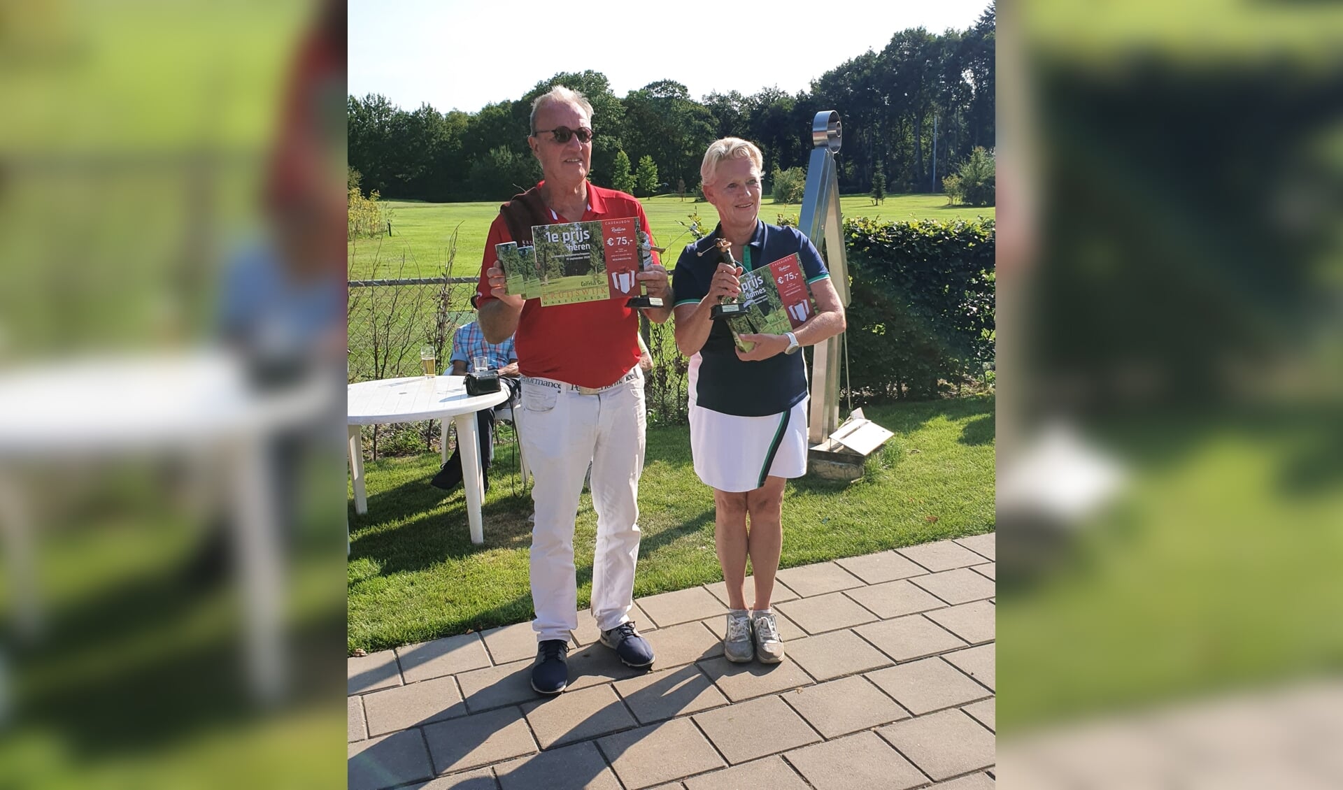 De winnaars van de clubkampioenschappen Hans van Rosmalen (l) en Monica Smolders (r)