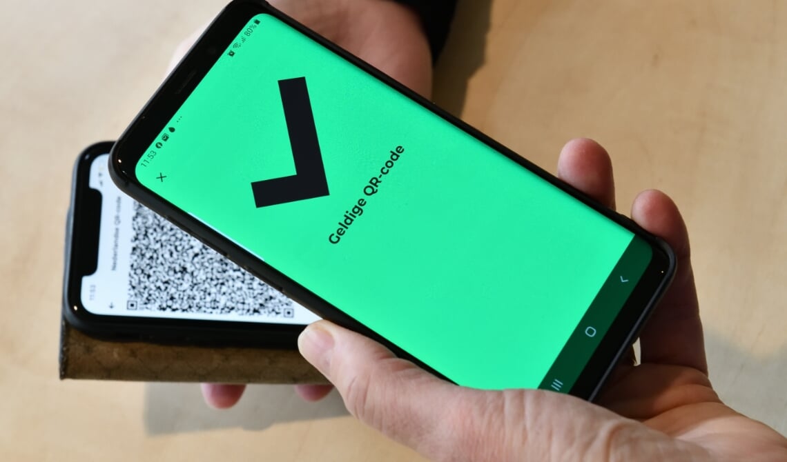 <p>De QR-code wordt gescand en een groen scherm verschijnt</p>