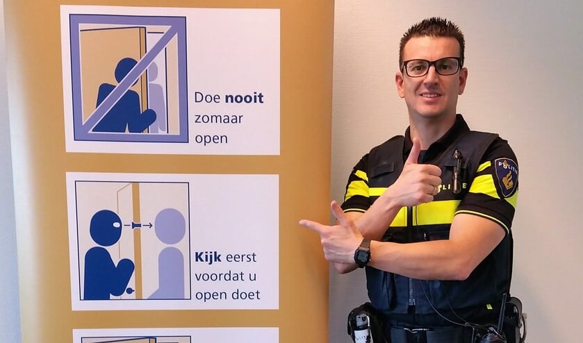 Wijkagent Karim Habyby: "Doe niet zomaar open" (foto: politie LDVB).