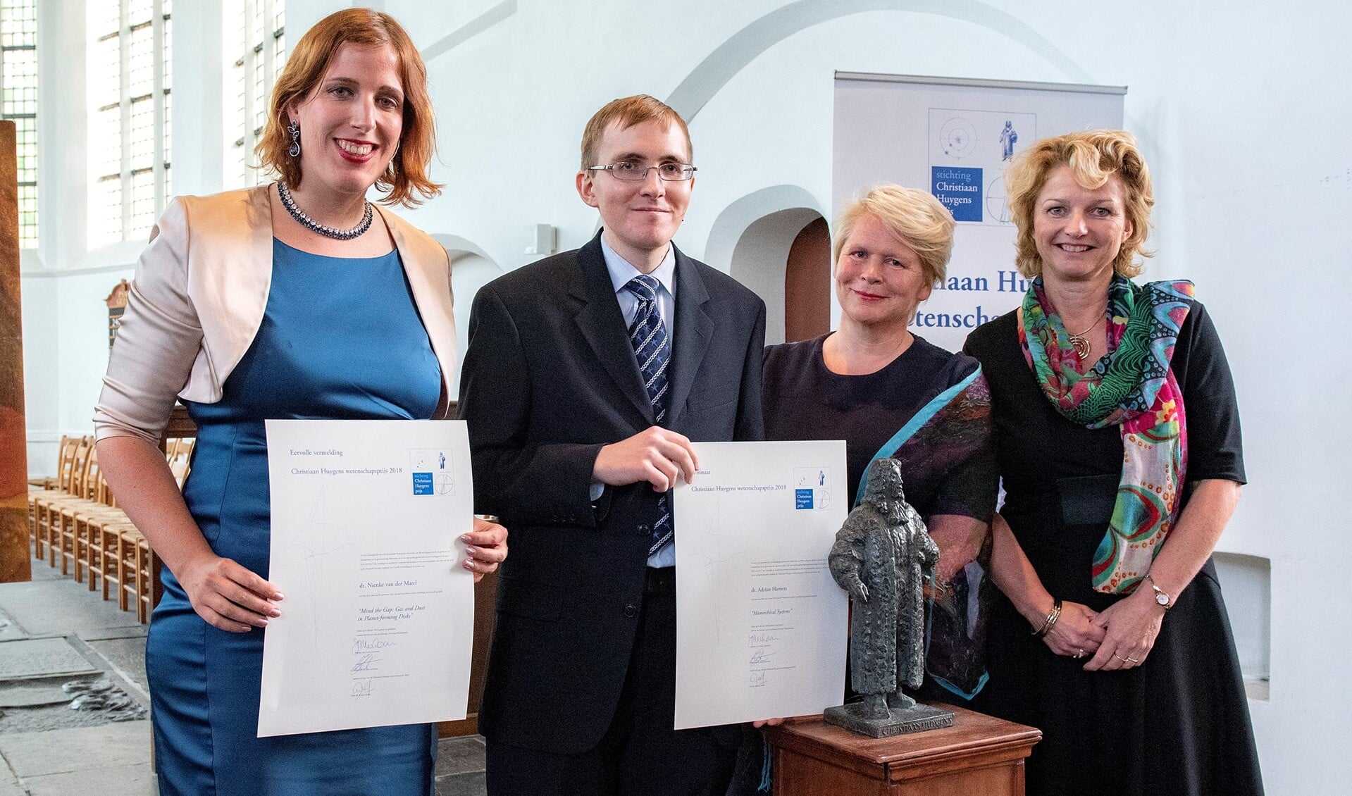 Adrian Hamers (2e van links) ontving de Christiaan Huygens Wetenschapsprijs) (foto: Michel Groen).