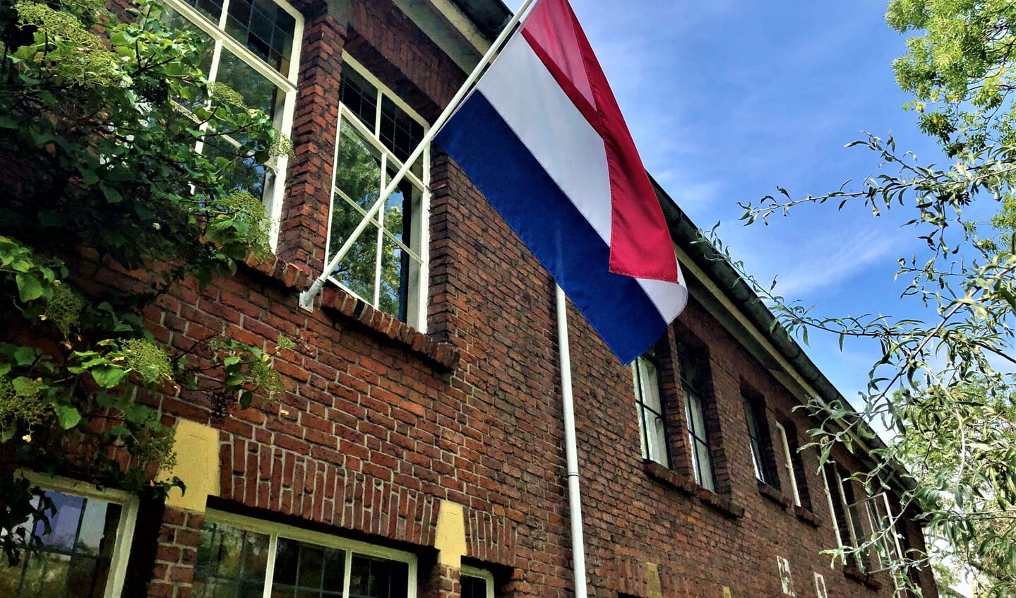 Nederlandse vlag aan de gevel van een woning in Leidschendam (foto: gemeente LV).
