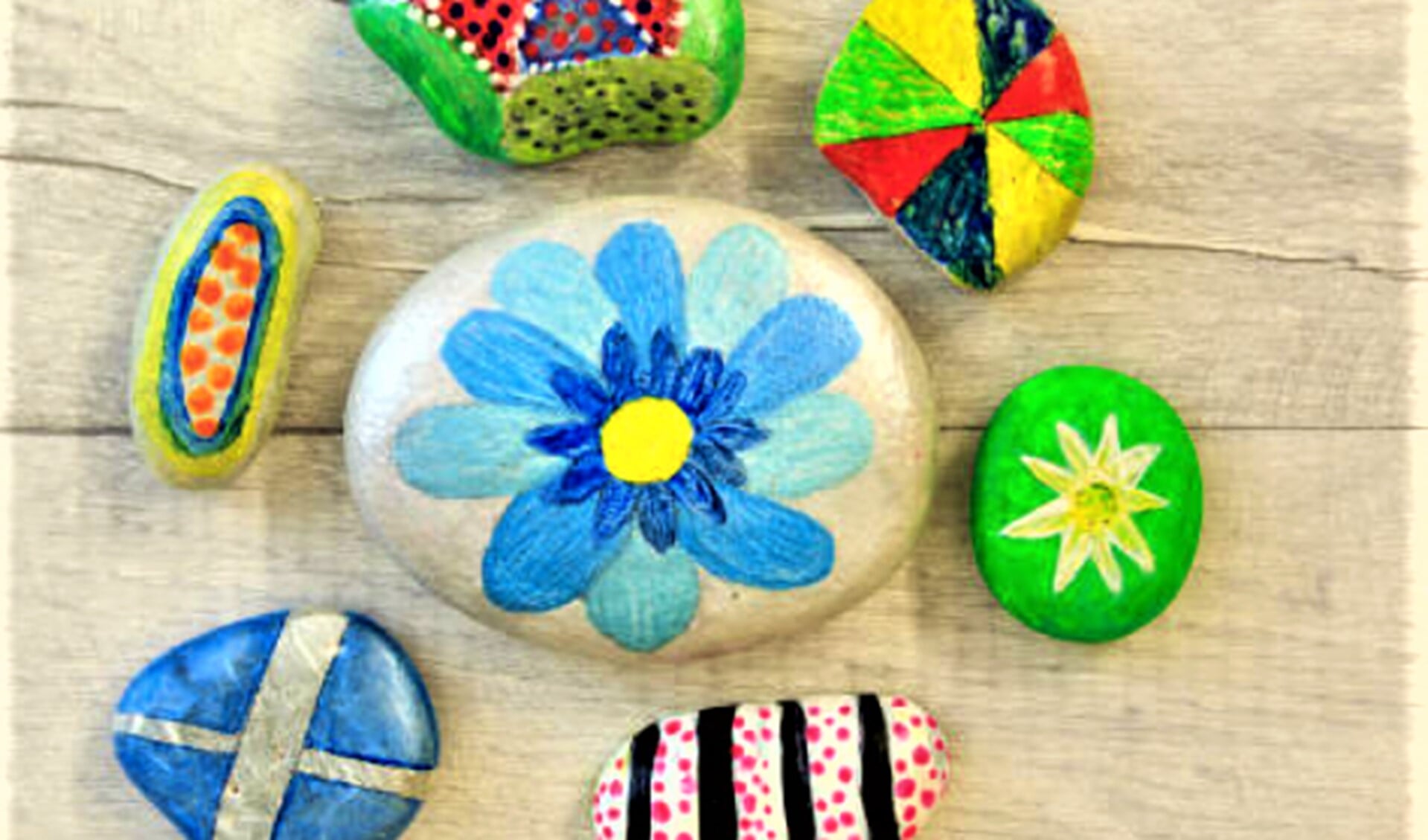 Happy Stones zijn kleurrijk versierde stenen die je kunt verstoppen in de natuur zodat anderen ze vinden.
