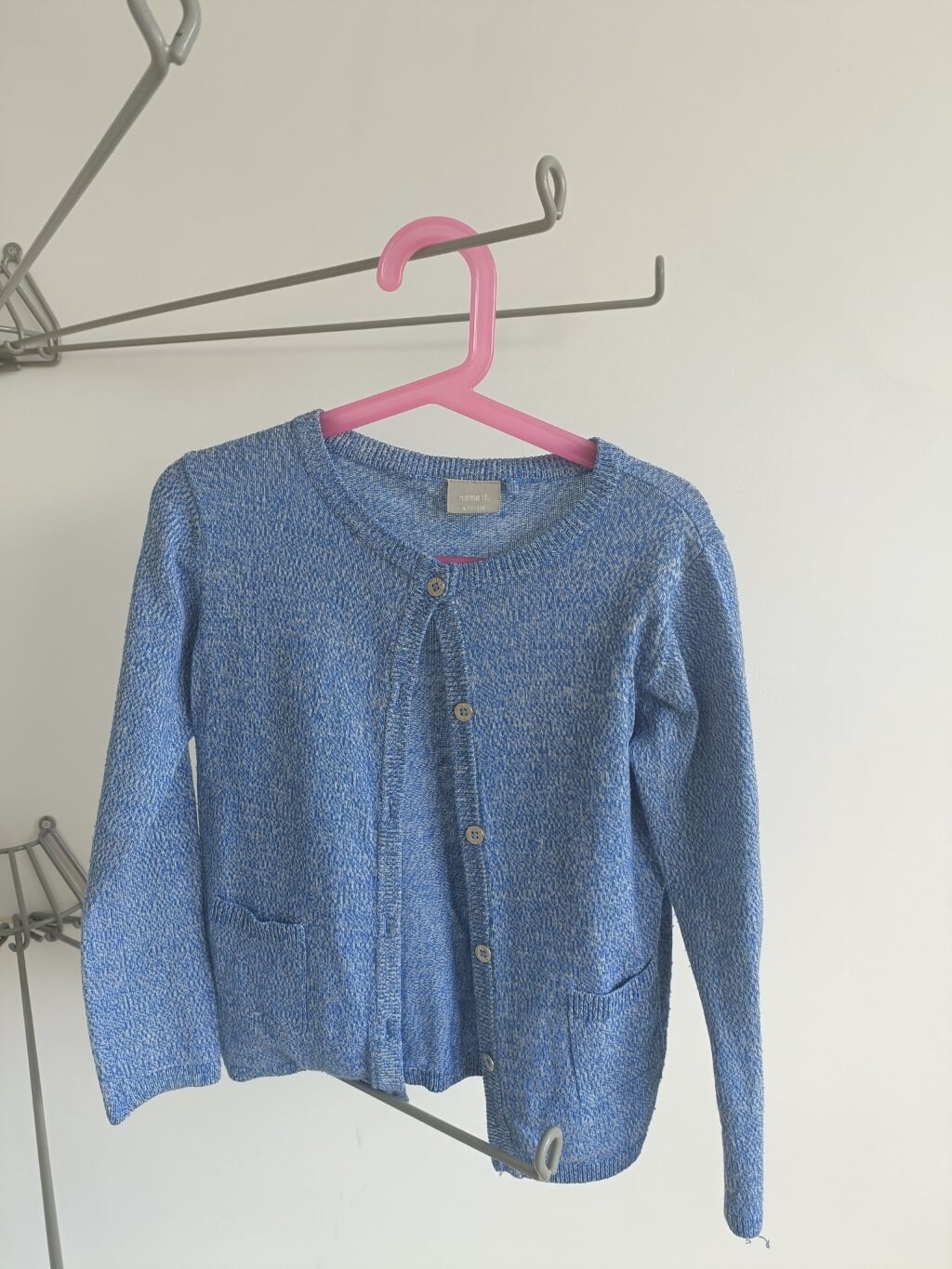 Blauw vestje 110 valt groot